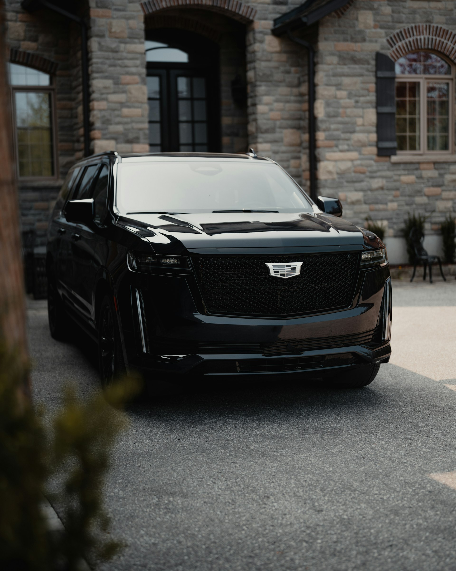 Escalade ESV arriving at a private estate